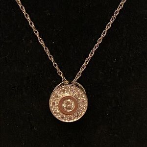 Diamond 14kt WG circle pendant on 18”chain.